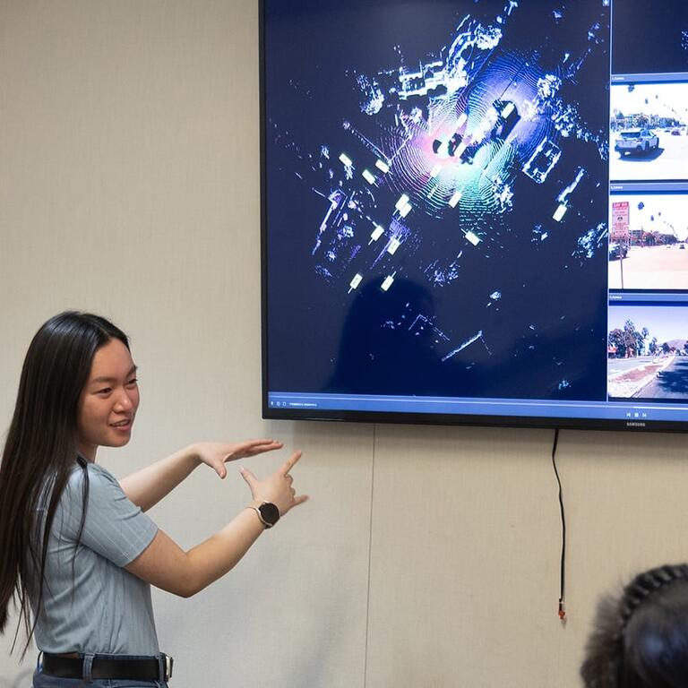 UCR student is using AI tools on laptop for virtual reality designs.